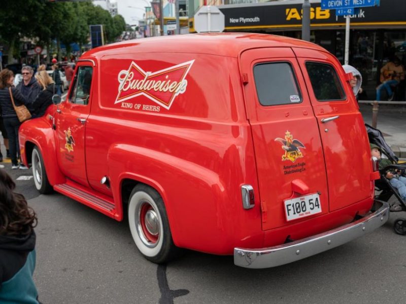AmericarnaNewPlymouthCarnival-02869 Vintage red American delivery van with Budweiser branding at Americarna event.