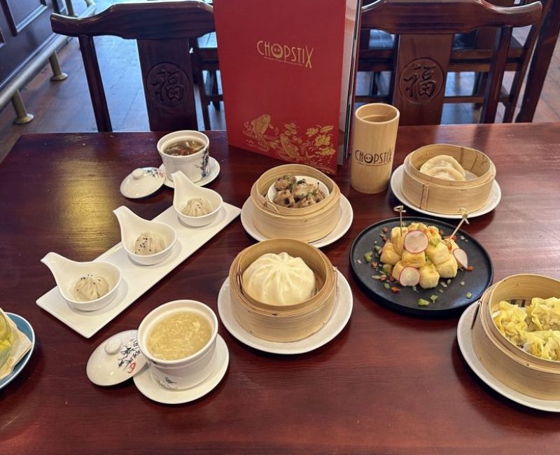 Delicious Chinese dim sum selection at Americarna restaurant, featuring steamed dumplings and soup.
