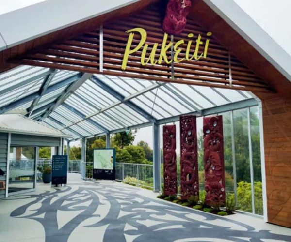 Colourful Puketi sign at Americarna event entrance New Zealand.