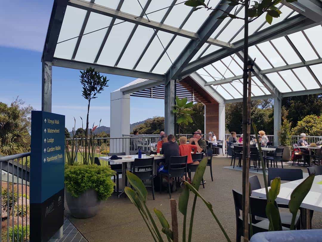 Vecutre deck at Americarna event, showcasing outdoor seating amidst scenic landscape.