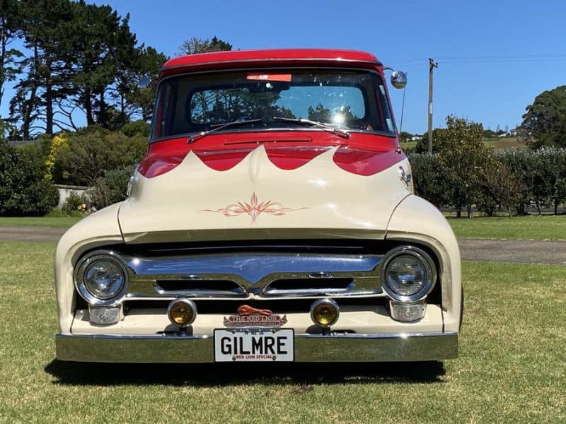 Classic 1950s American truck with custom paint and chrome details at Americarna car show.