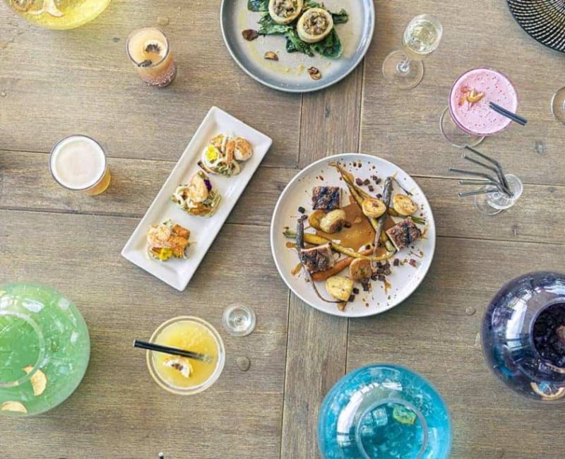 Colourful cocktails and gourmet dishes served at Americarna celebration in NZ.