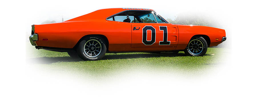 Vintage orange General Lee car from Dukes of Hazzard on display at Americarna. Classic American muscle car with a bold design.