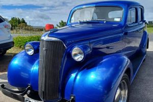 Blue vintage classic car at Americarna event in New Zealand, stylish retro automobile in excellent condition.