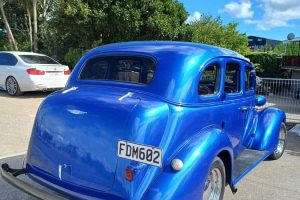 Vintage blue classic American car, restored classic vehicle at Americarna event, New Zealand.