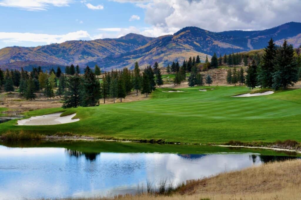Scenic golf course with mountains backdrop