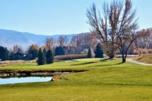 Scenic golf course with autumn trees