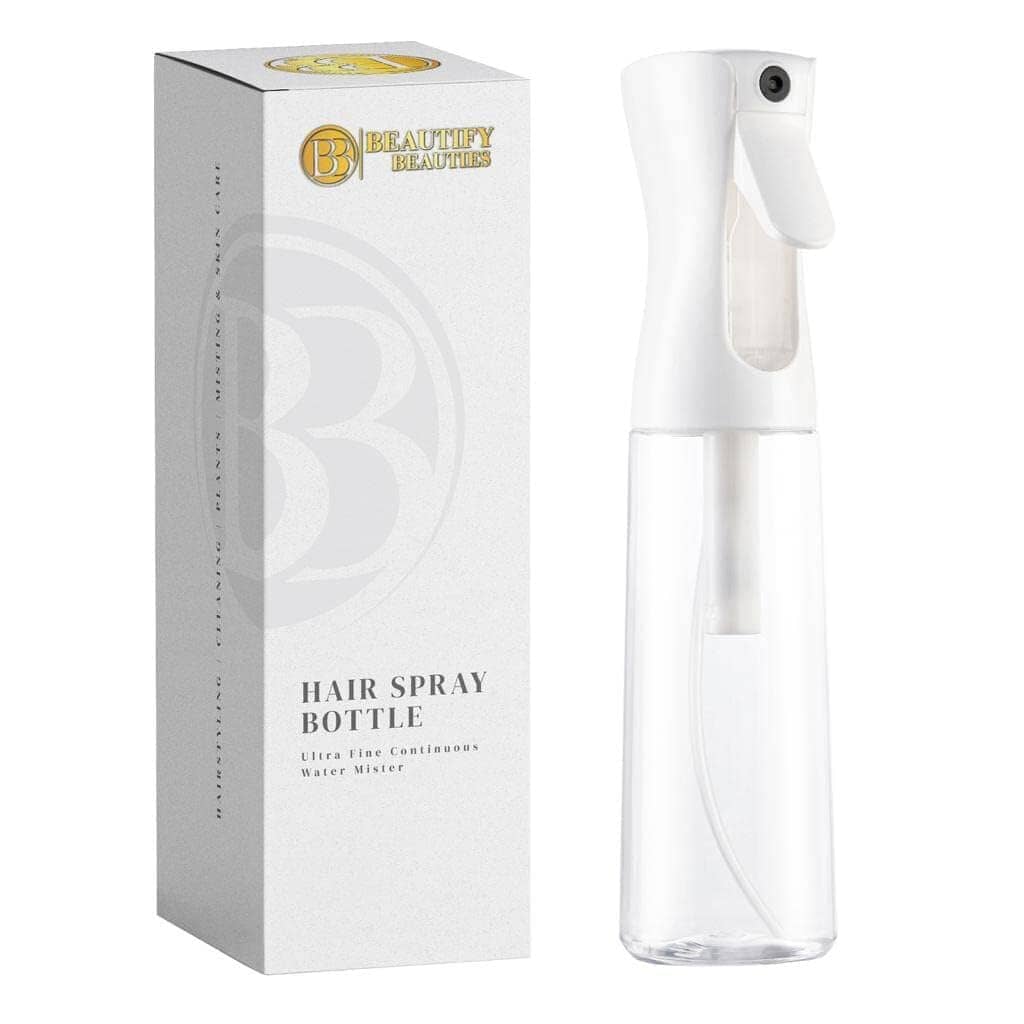 White continuous mist spray bottle with product packaging box, used for curly hair hydration routines