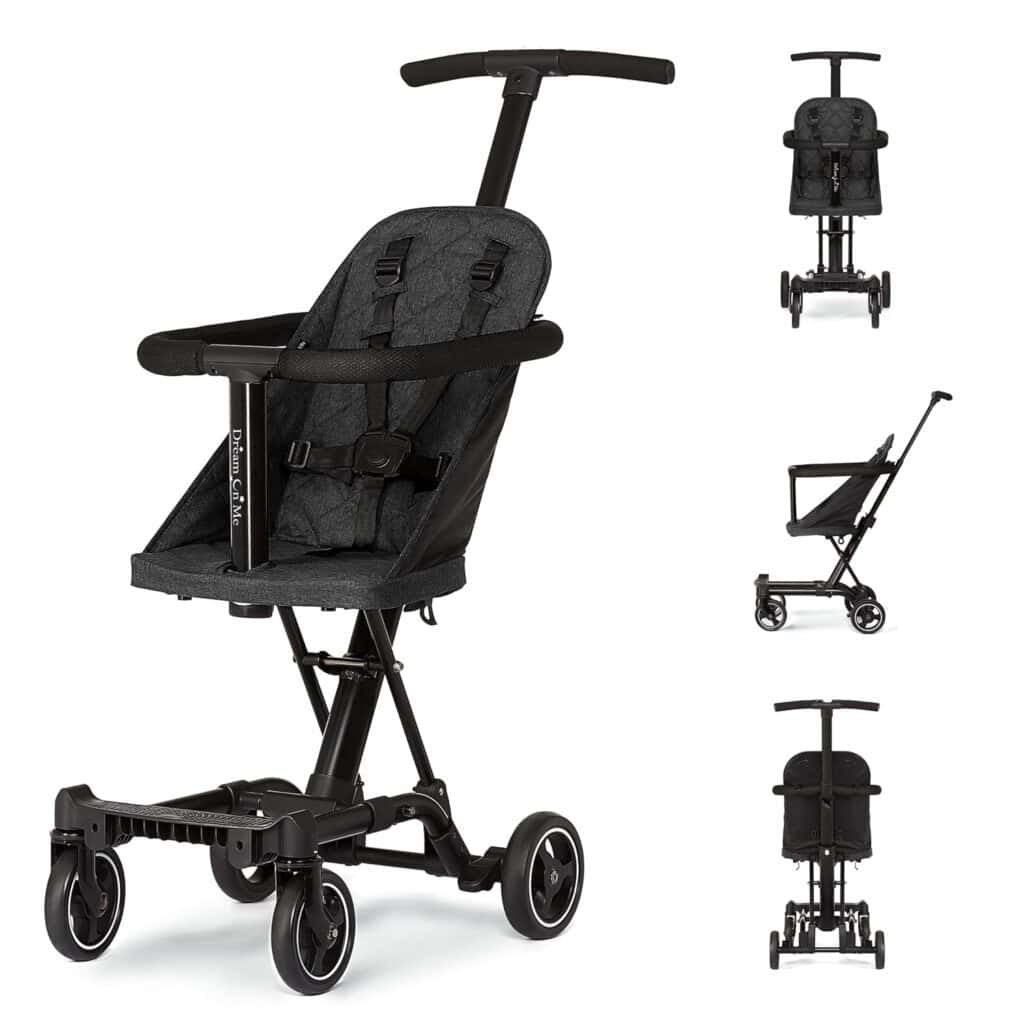 Dream On Me Lightweight Travel Stroller in black with padded seat, safety harness, and compact foldable frame – ideal for air travel and everyday use