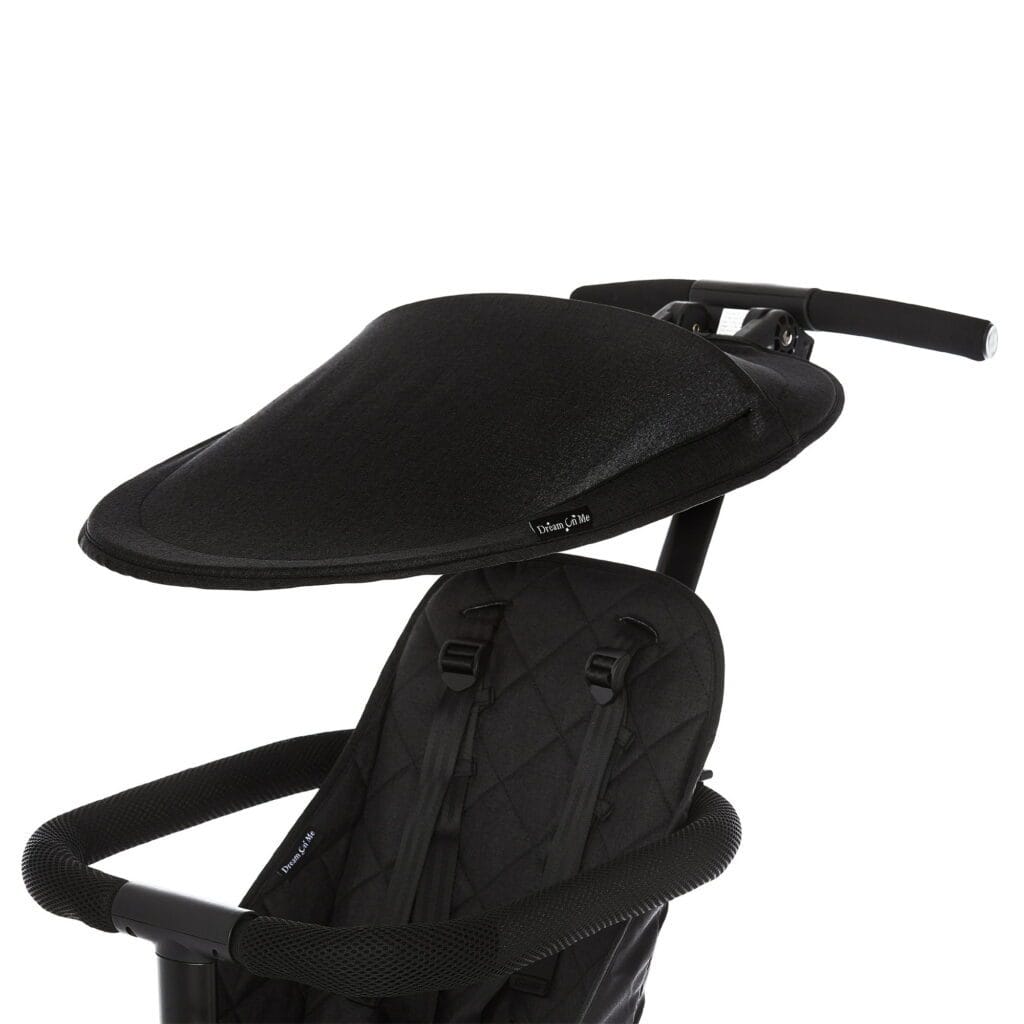 Black sun canopy accessory for the Dream On Me stroller, designed to provide UV protection and fold easily for travel comfort