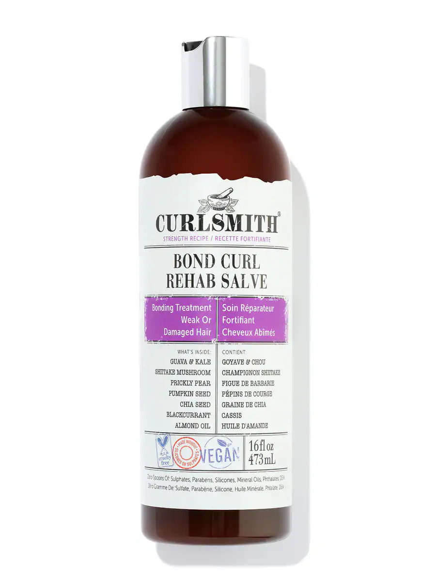 Tall bottle of Curl Rehab by Curl Junkie, a hydrating deep conditioner ideal for restoring bounce and moisture to dry, curly hair.