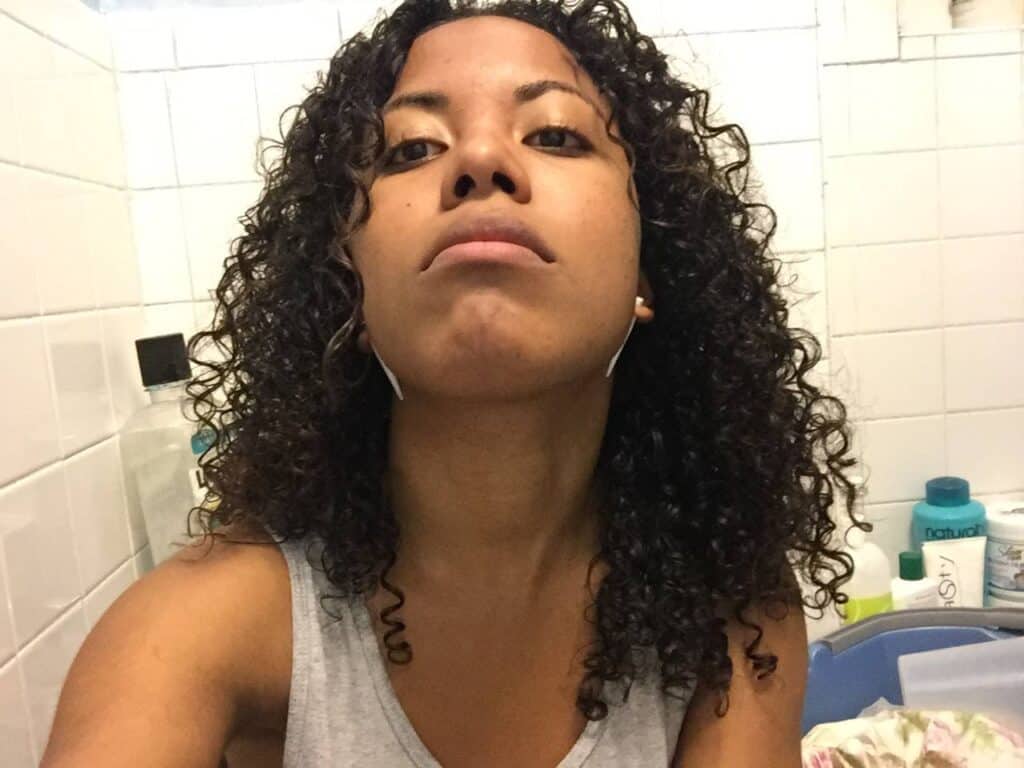 Close-up of curly hair from the front, showing tight, moisturized ringlets after using the Seaberry routine.