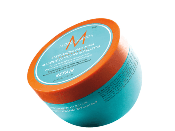 Tan jar of Moroccanoil Intense Hydrating Mask, a rich, argan oil-infused treatment that deeply moisturizes and revives dry, curly hair for added softness and shine.