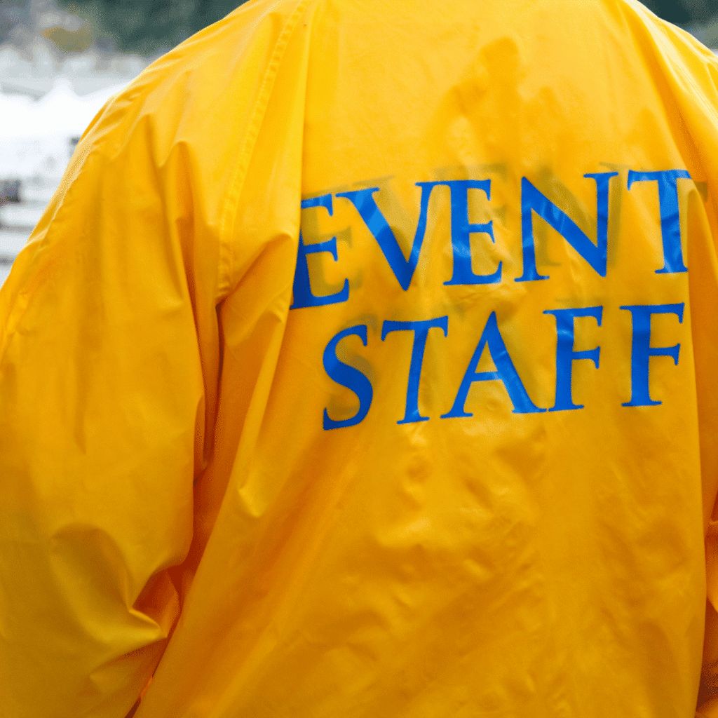 Event staff member helping support a community event