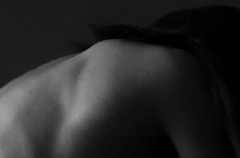 a woman with her back turned to the camera