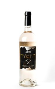 Bouteille de Baies de Timut pour apéritif, saveur unique et épicée.