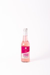 Bouteille de sirop artisanal Jardin d'Eden à la rhubarbe et hibiscus, parfait pour des apéritifs ins.