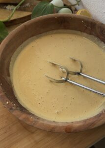 Light and fluffy beaten eggs with brown sugar, ready to be added to brownie batter.
