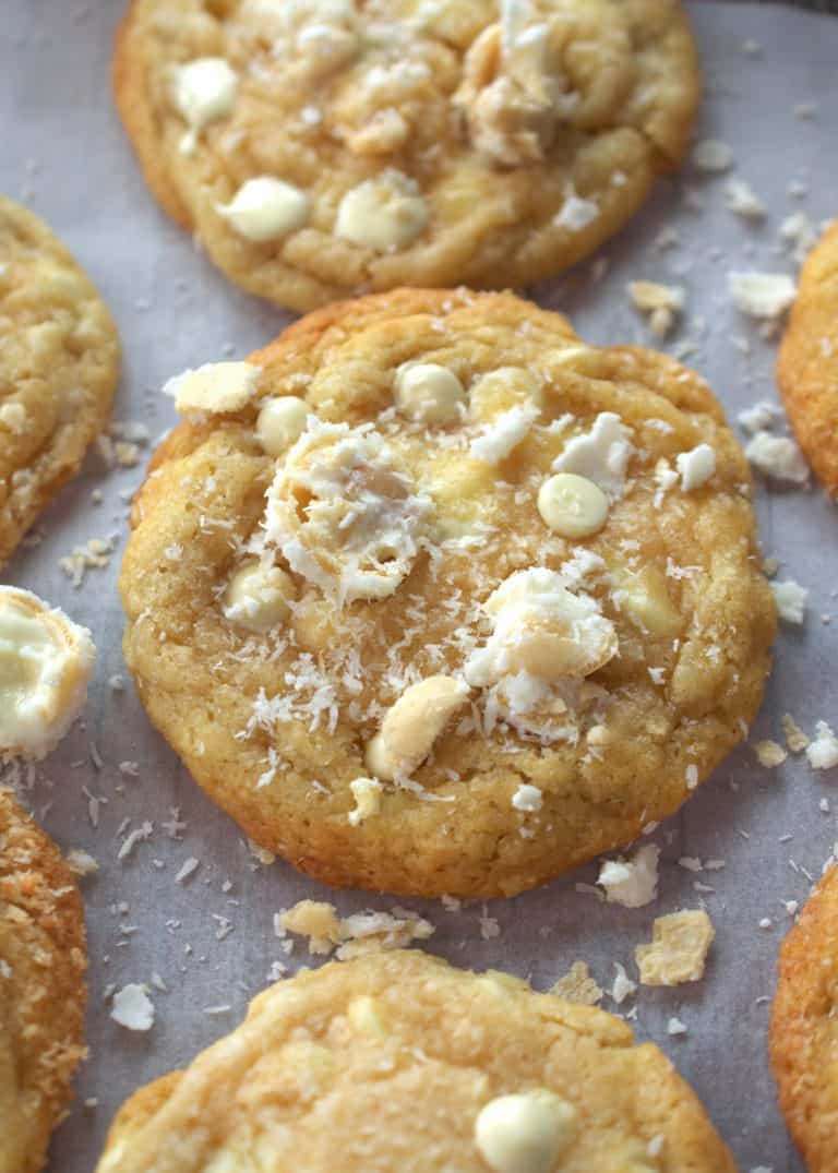 Raffaello cookies that have crispy edges, and a chewy interior, you can see the chopped Raffaello, coconut shavings, and white chocolate.