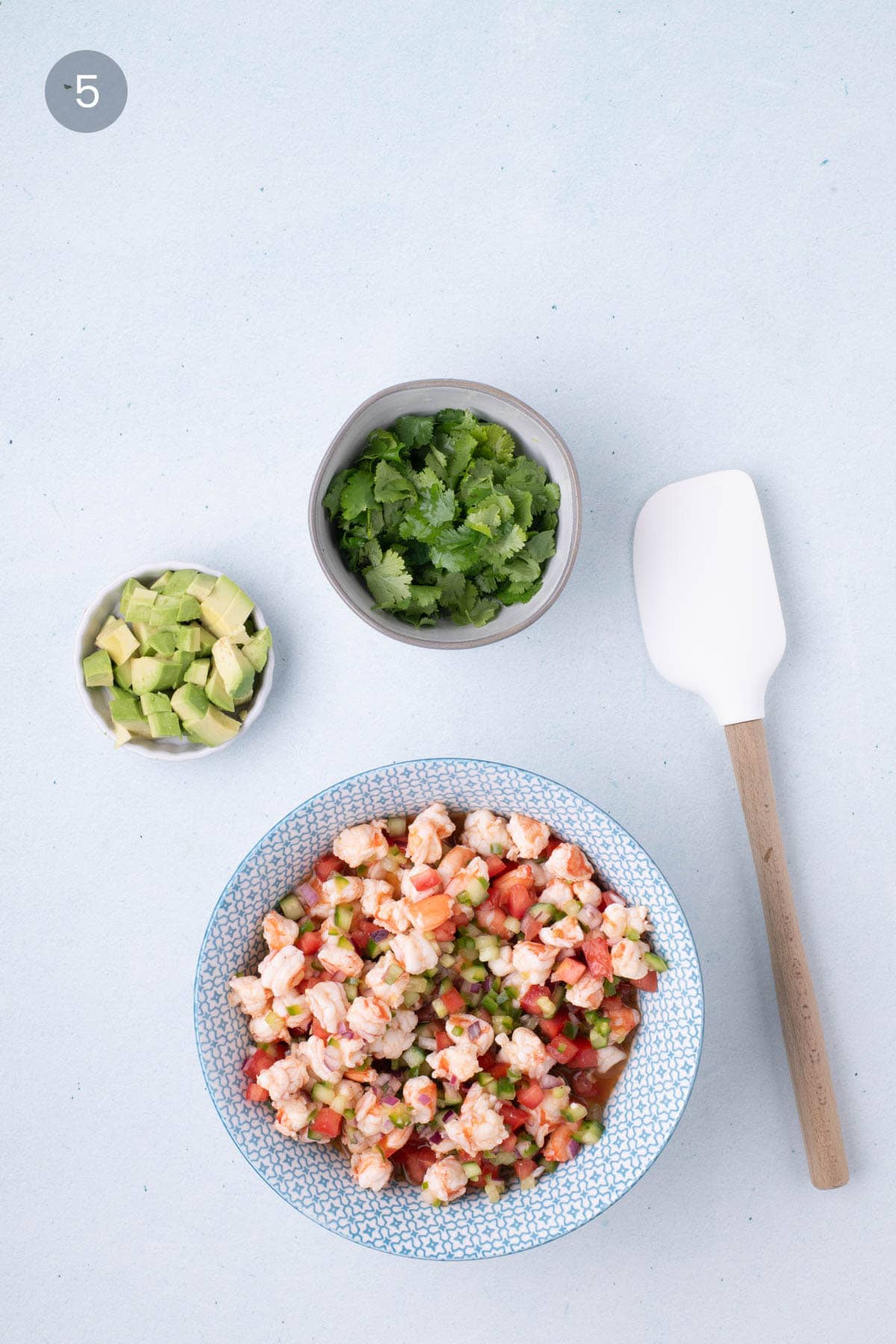 Diced avocado and cilantro for shrimp ceviche topping