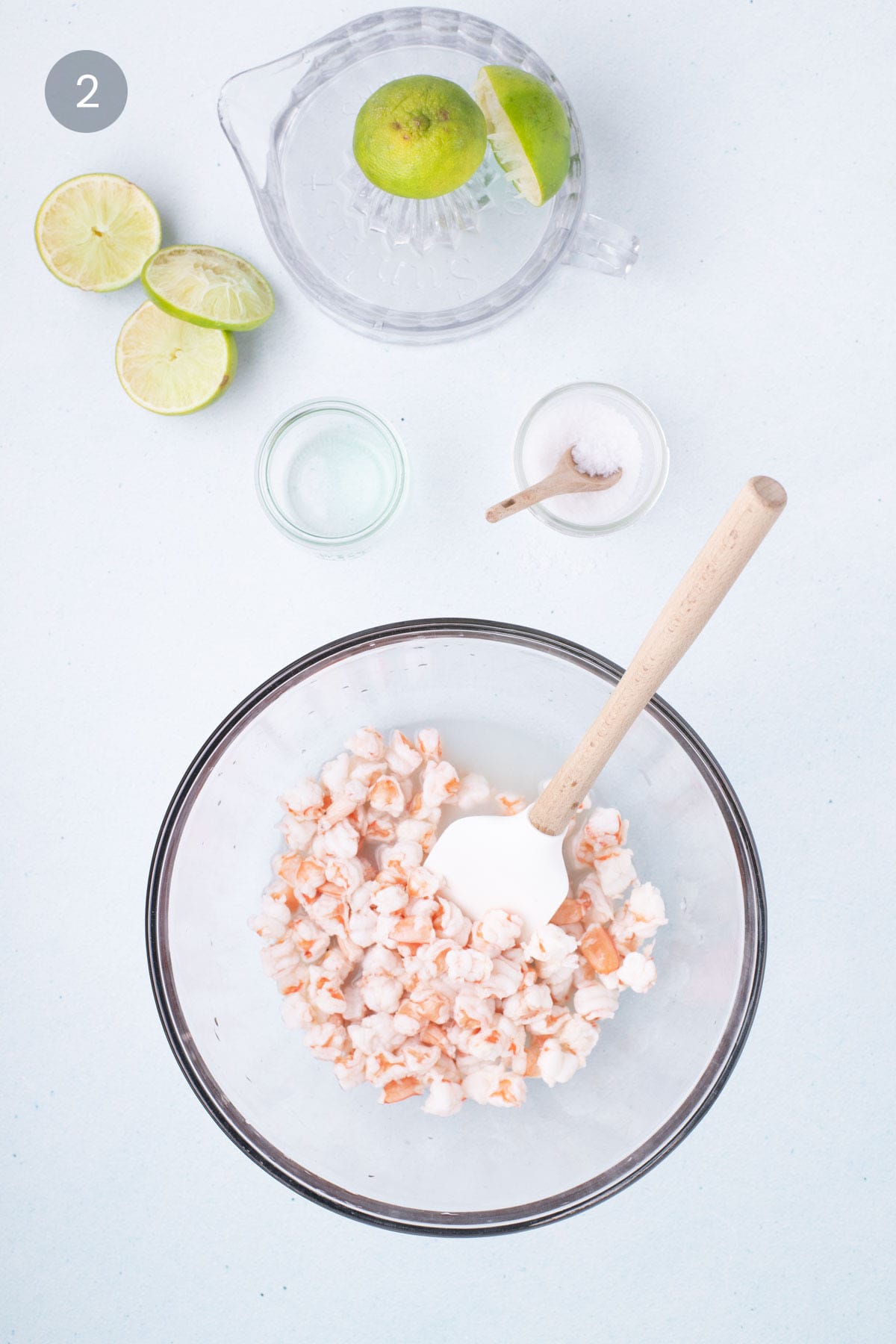 Shrimp turning opaque and pink from lime juice in ceviche recipe