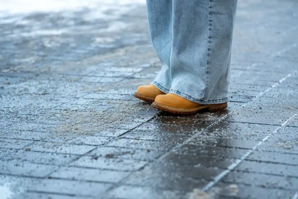 Comfortable winter footwear for icy conditions, outdoor walking shoes, durable tan boots, slip-resistant soles, casual style, cold weather gear, winter fashion, outdoor activity shoes, rugged footwear.