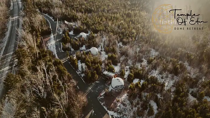 Aerial shot of the Temple of Eden Retreat domes. Nova Scotia glamping domes.