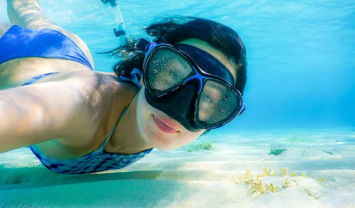 young lady snorkeling in Punta Cana