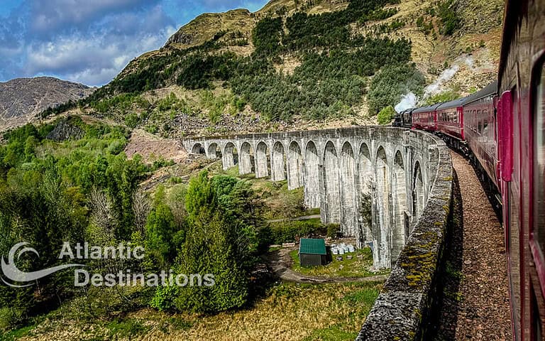 Scottish highlands tour - on the Jacobite Express going across Glenfinnan viaduct.