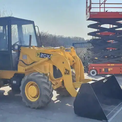 JCB 2CX gumikerekes homlokrakodó kompresszorral