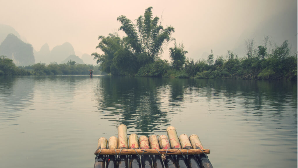 China guilin yangshuo bamboo rafting in the beautiful "yulong river"