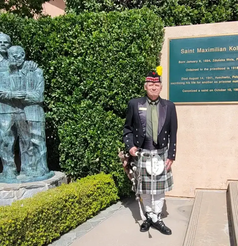 kolbe funeral bagpipe player