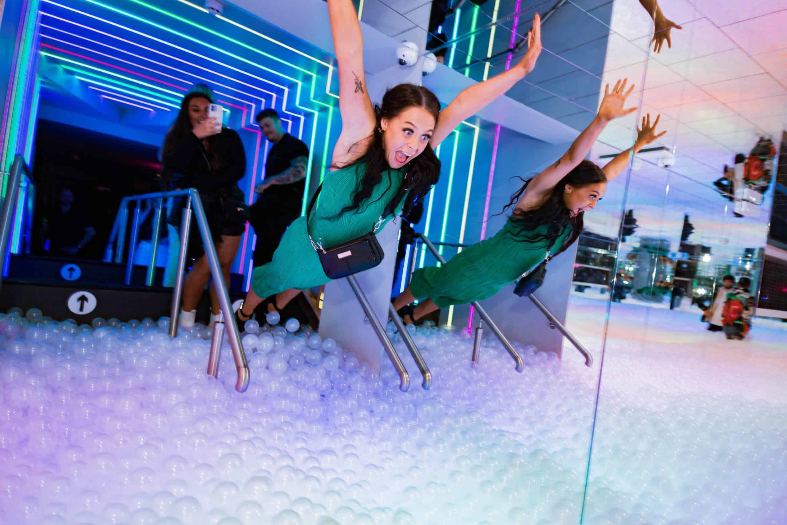 Brightly coloured ball pit at popular London venue, perfect for fun and entertainment.