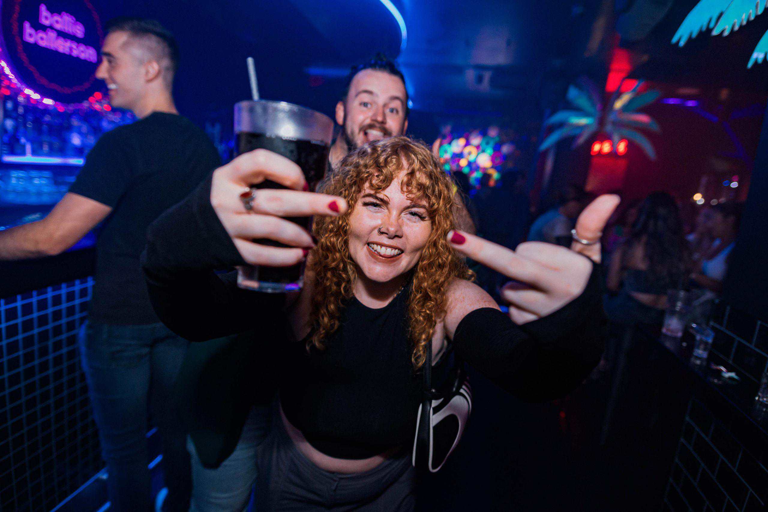 Vibrant party scene at Ballie Ballerson with guests enjoying drinks and socialising in a colourful, lively setting.