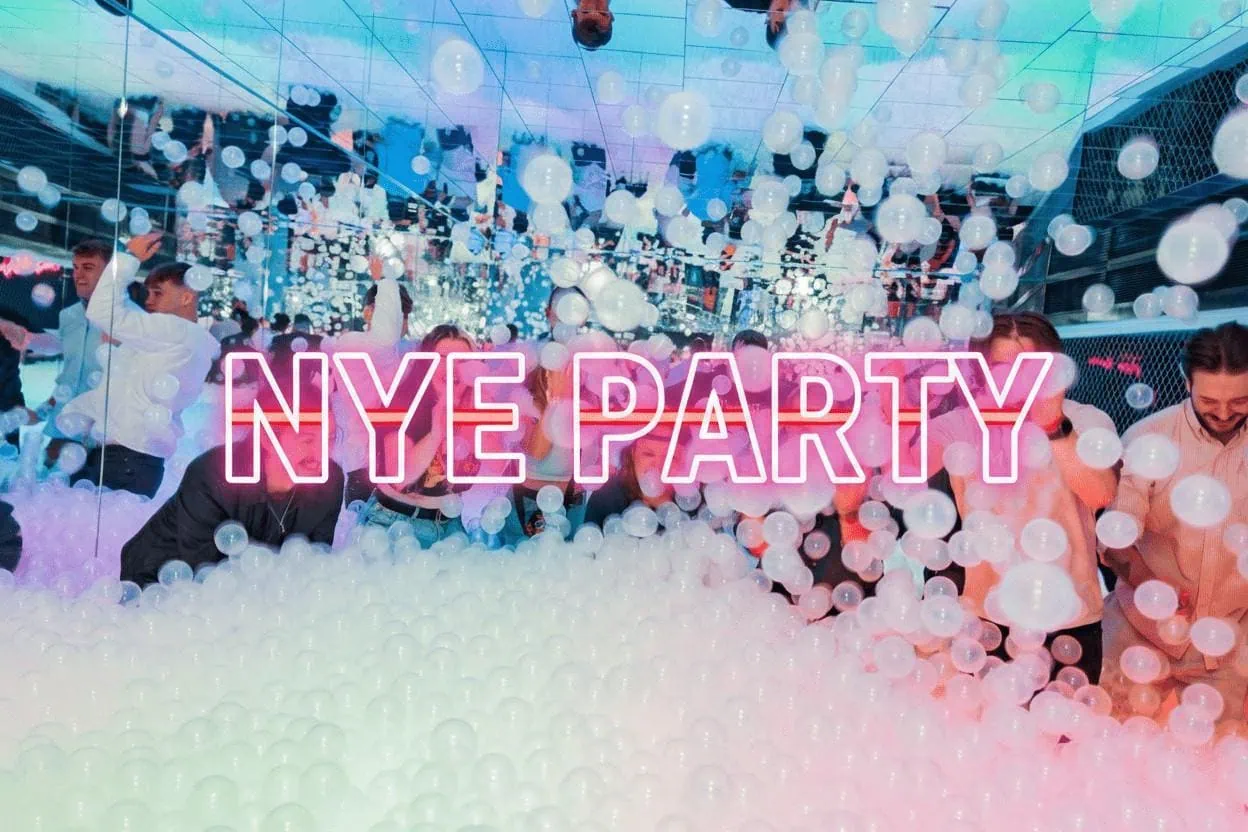 Spooky skeleton decor with purple spider web Halloween theme at Ballie Ballerson London.