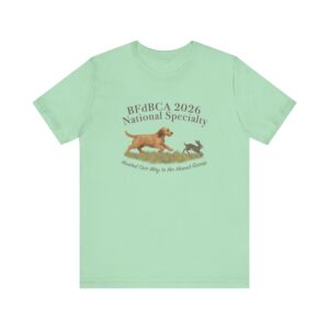 Mint green shirt with dog and rabbit graphic.