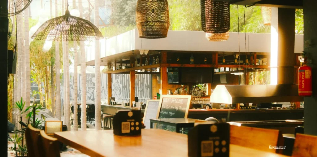 Best Interior Restaurant in Chittagong: A Complete Guide 3 Indoor restaurant with bamboo accents and lush greenery.