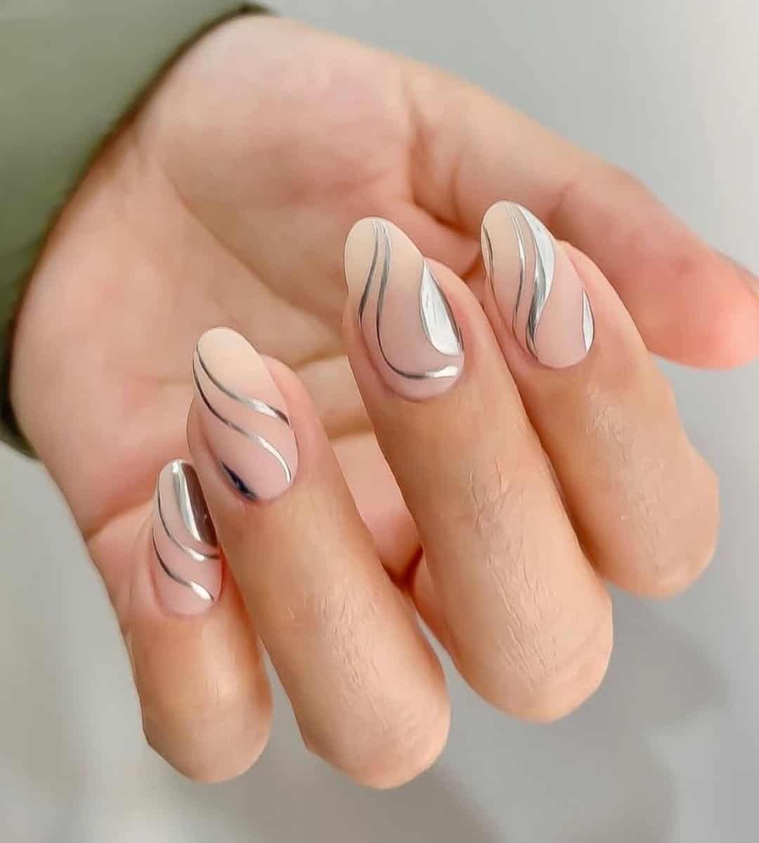 Clean Silver Swirls Nails.