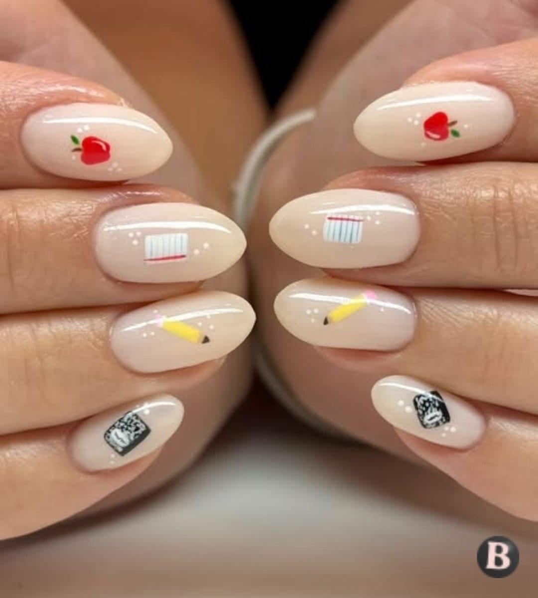 Nude Almond Nails with School Supply Doodles