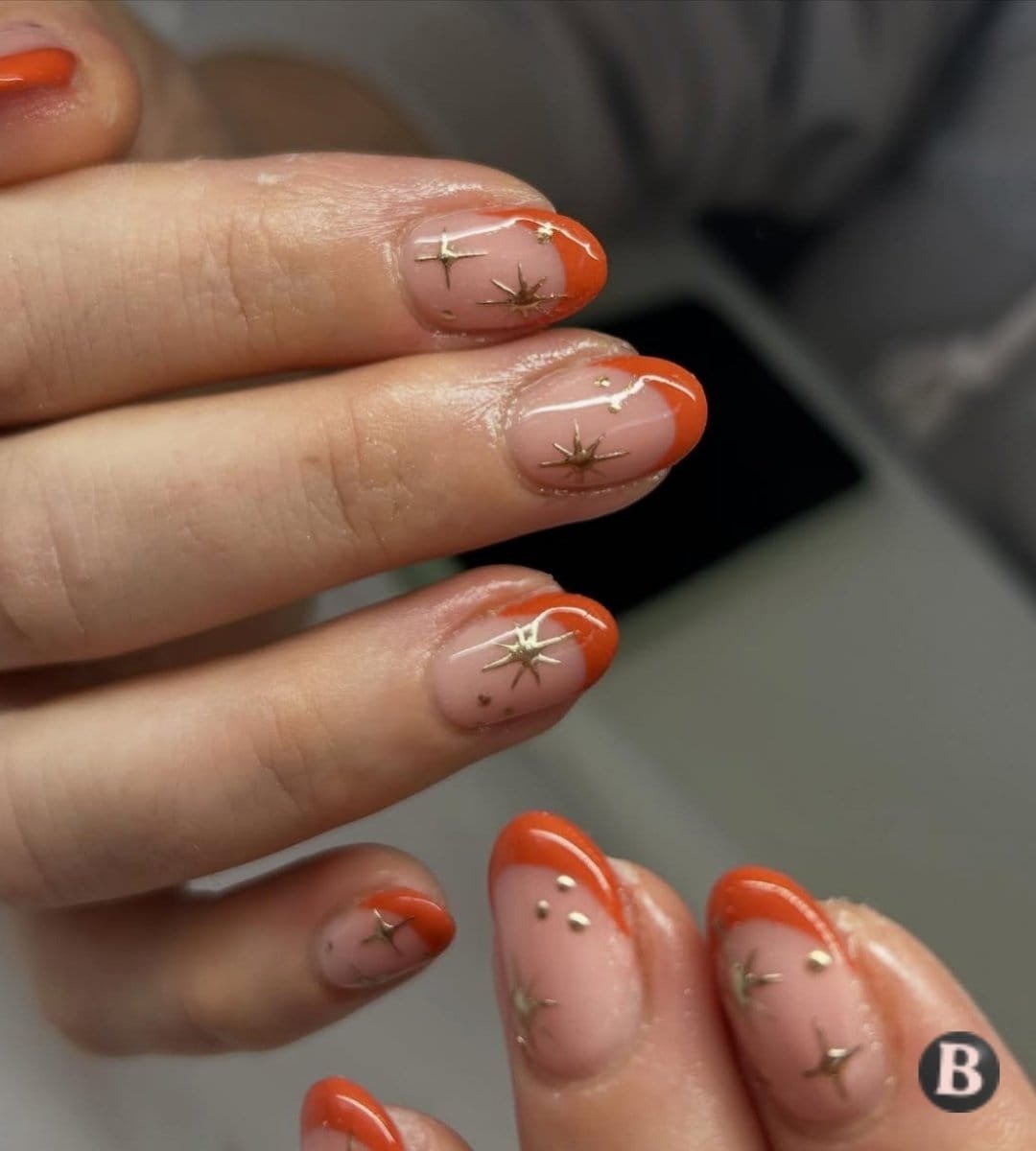 Burnt Orange & Gold Starburst Celestial French Tip Nails