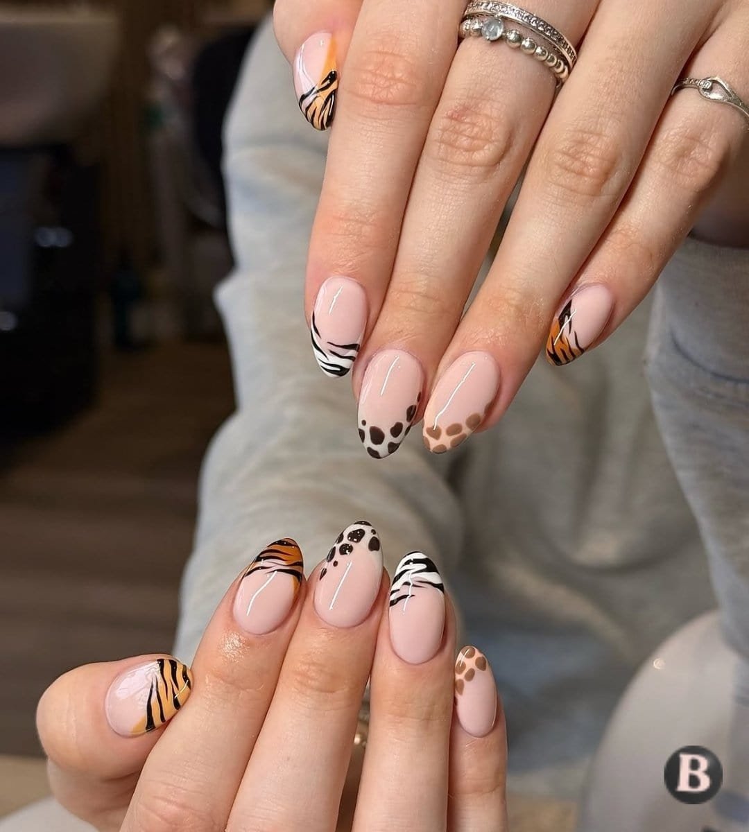 Glossy Nude Safari French Tip Animal Print Nails