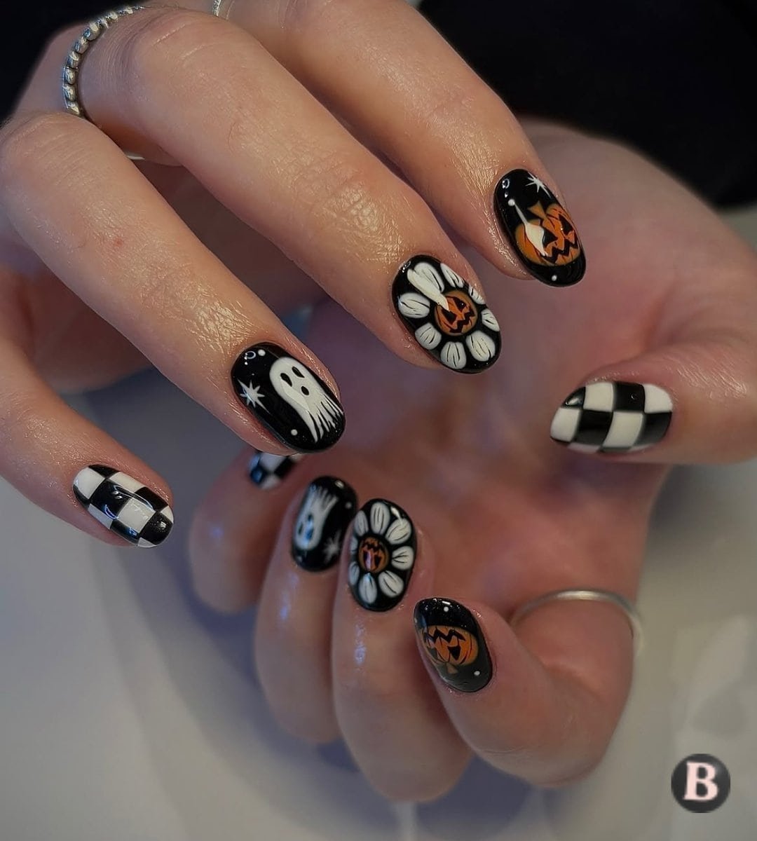 Spooky Black Checkerboard & Pumpkin Daisy Nails