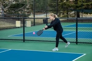 Young Woman Playing Pickleball