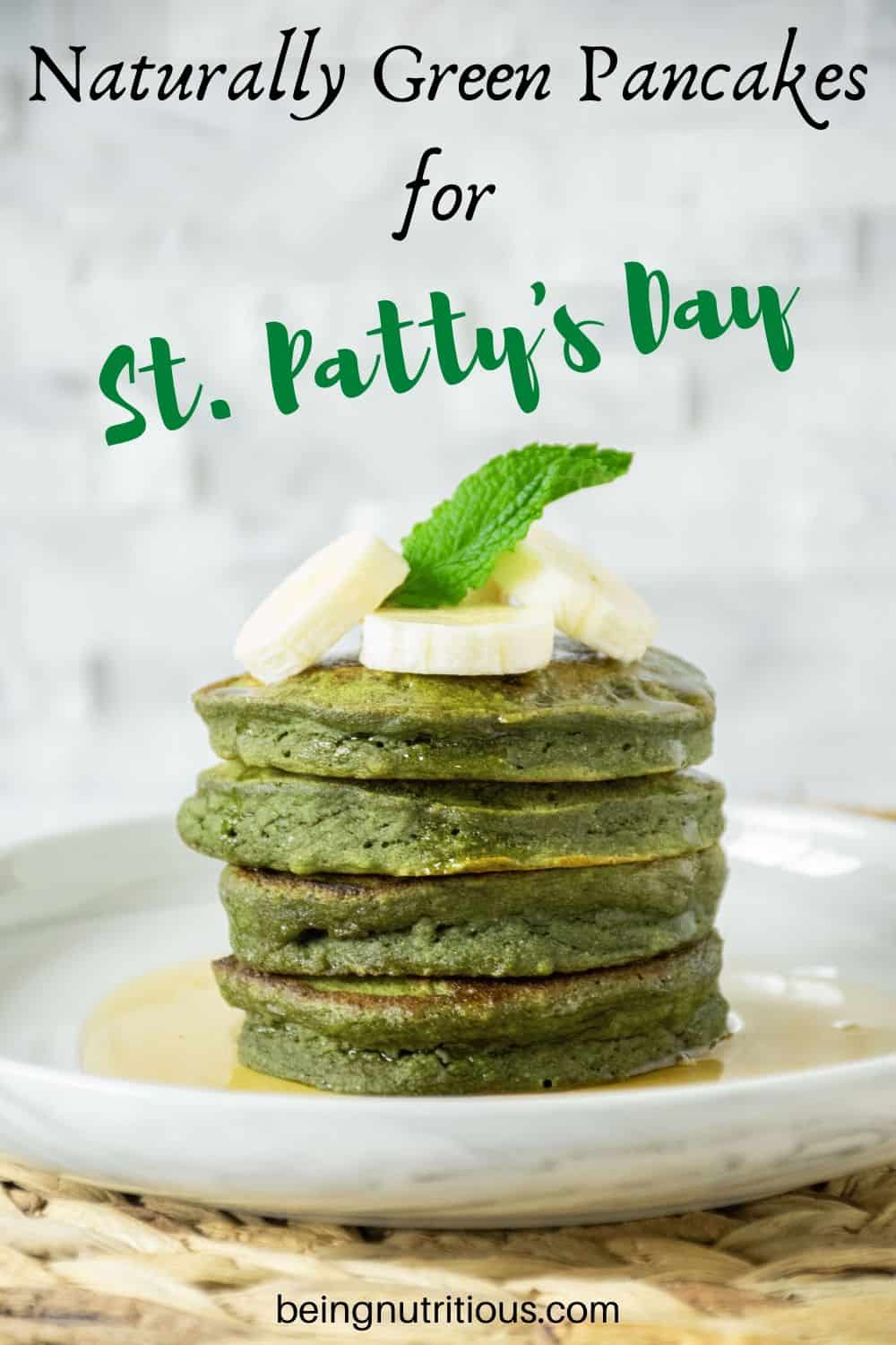 Stack of 4 Banana Mint Pancakes with banana slices and a mint leaf on top.