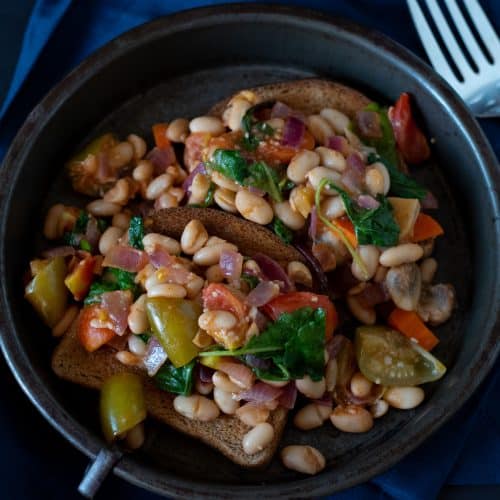 Breakfast Hash on toast in a metal dish