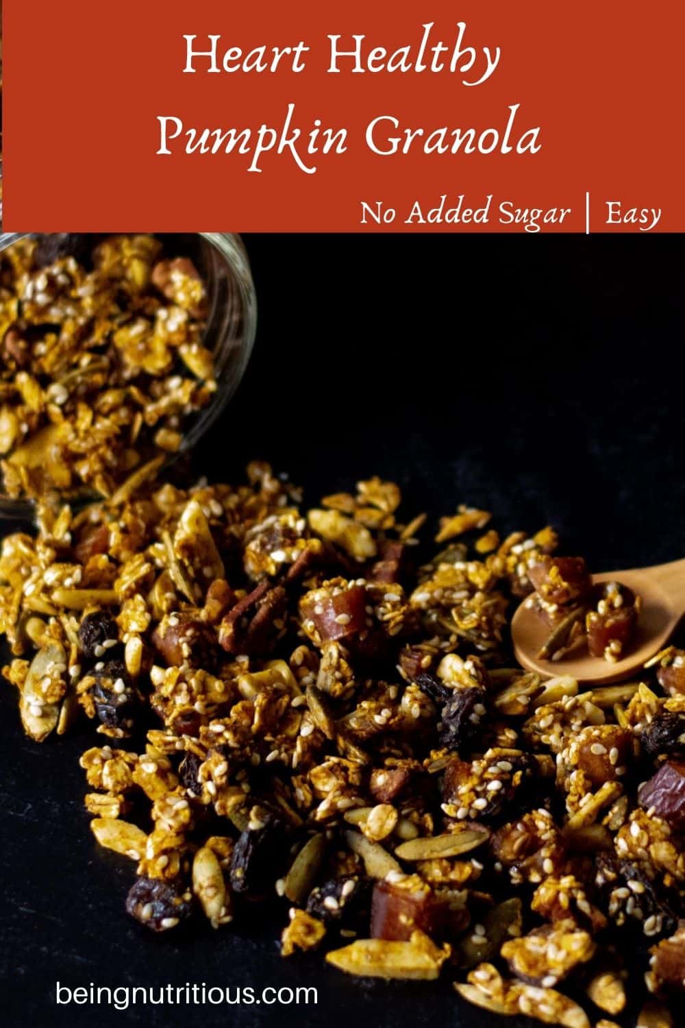 Granola spilling out of a Mason jar on a black background with text overlay: Heart Healthy Pumpkin Granola, no added sugar, easy.