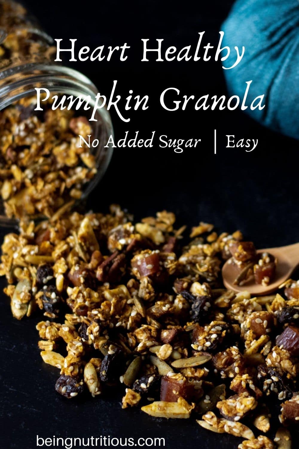 Granola spilling out of a Mason jar on a black background with text overlay: Heart Healthy Pumpkin Granola, no added sugar, easy.