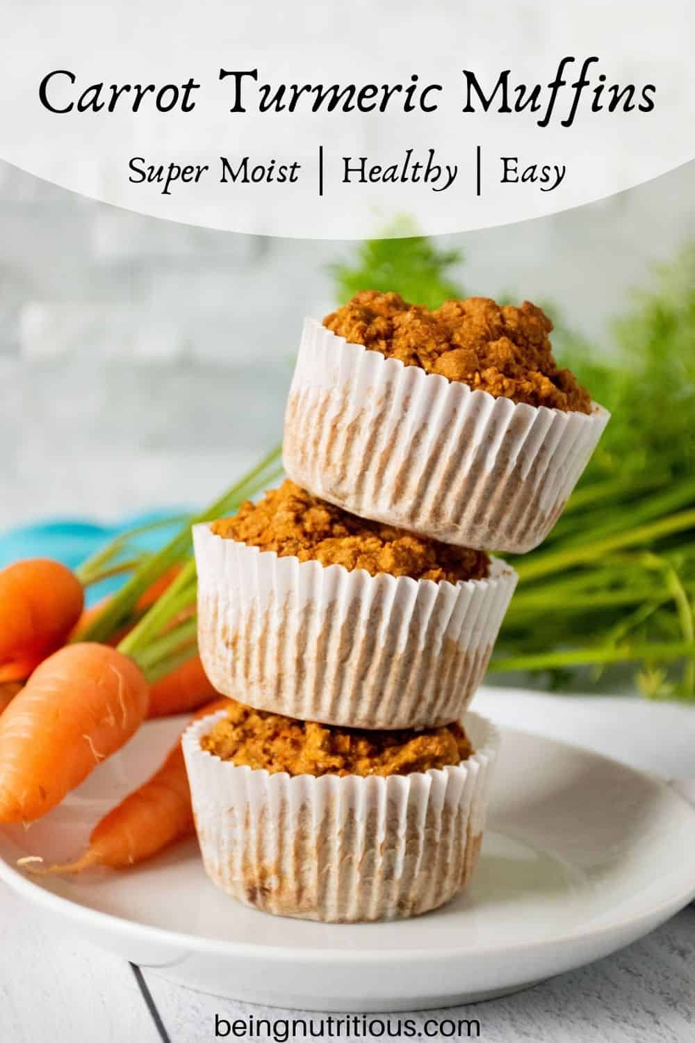 Stack of 3 muffins on a plate with fresh carrots in the background. Text overlay: Carrot Turmeric Muffins; super moist, healthy, easy.