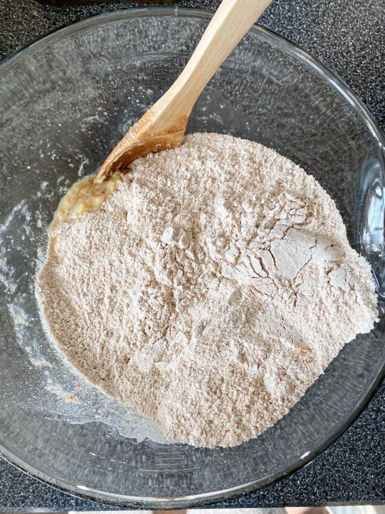 Dry ingredients in wet ingredients.