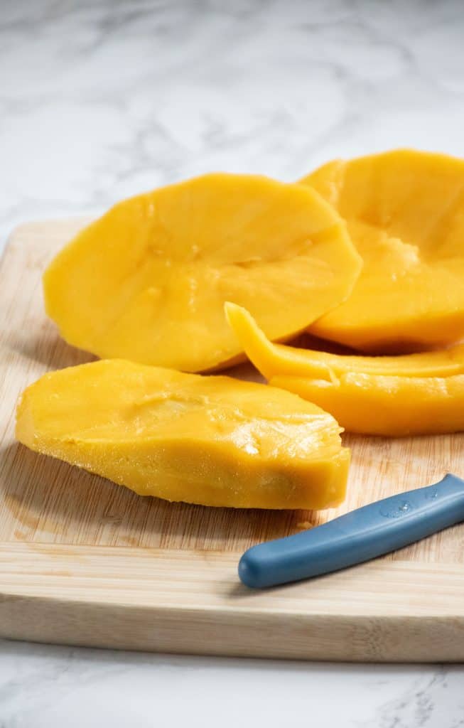 Mango seed with flesh removed.